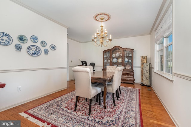 3 Baird Ct, Carlisle, PA 17013 - dining area featuring a chandelier, ornamental molding, and wood finished floors