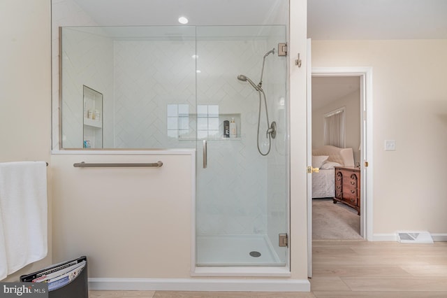 3 Baird Ct, Carlisle, PA 17013 - full bathroom featuring wood finished floors, ensuite bath, and a shower stall