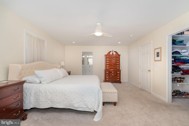 3 Baird Ct, Carlisle, PA 17013 - bedroom featuring a walk in closet, light carpet, a closet, a ceiling fan, and ensuite bath