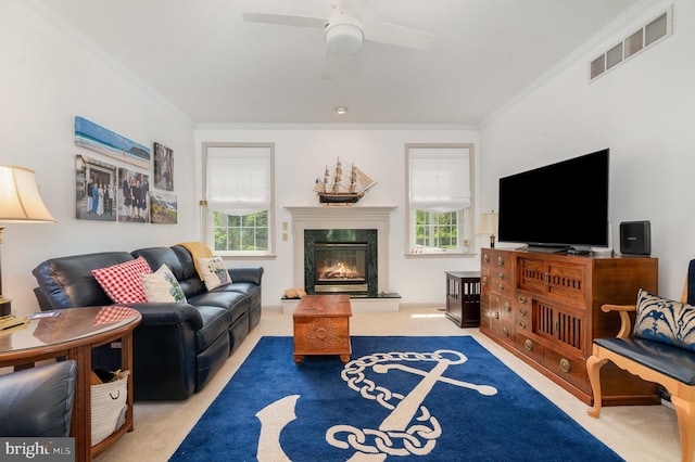 3 Baird Ct, Carlisle, PA 17013 - living area featuring crown molding, carpet floors, ceiling fan, and a premium fireplace