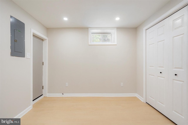 4618 Arabia Ave, Baltimore, MD 21214 - basement featuring electric panel, light wood finished floors, and recessed lighting