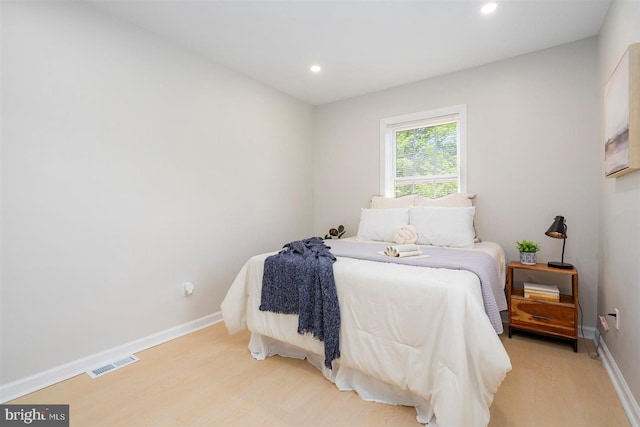 4618 Arabia Ave, Baltimore, MD 21214 - bedroom with light wood-style floors and recessed lighting