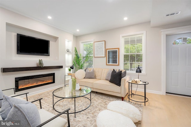 4618 Arabia Ave, Baltimore, MD 21214 - living room featuring a glass covered fireplace and recessed lighting