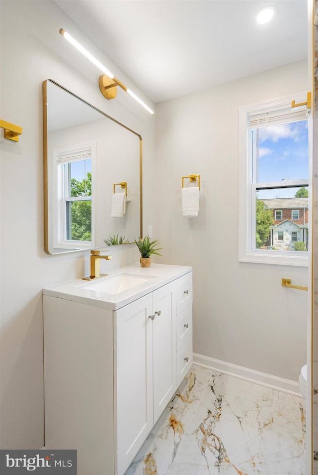 4618 Arabia Ave, Baltimore, MD 21214 - bathroom with vanity, marble finish flooring, and recessed lighting