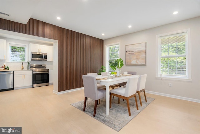 4618 Arabia Ave, Baltimore, MD 21214 - dining area with recessed lighting, healthy amount of natural light, and light wood-style floors
