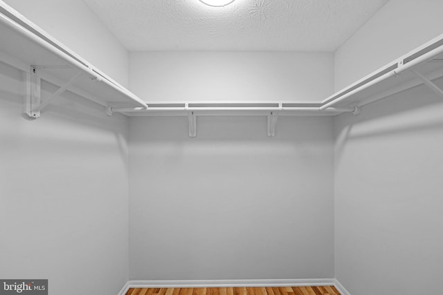 1632 Barnstead Dr, Reston, VA 20194 - walk in closet with wood finished floors