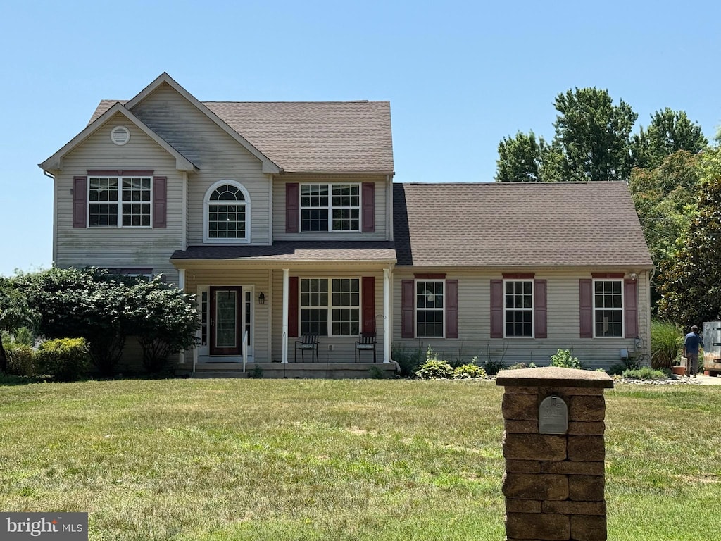 1686 Catawba Ave, Newfield, NJ 08344 - traditional home with a porch and a front lawn