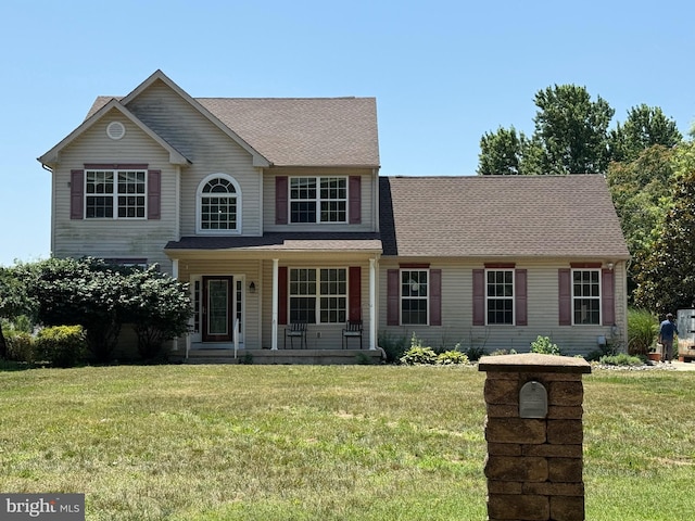 1686 Catawba Ave, Newfield, NJ 08344 - traditional home with a porch and a front lawn