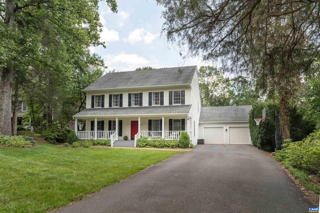 325 Heron Ln, Charlottesville, VA 22903 - colonial inspired home featuring a porch, driveway, a garage, a front lawn, and roof with shingles