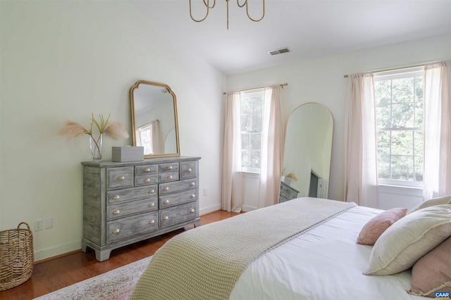 325 Heron Ln, Charlottesville, VA 22903 - bedroom with multiple windows and wood finished floors