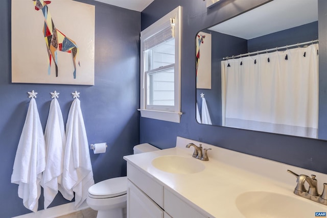 325 Heron Ln, Charlottesville, VA 22903 - bathroom with double vanity and a shower with shower curtain