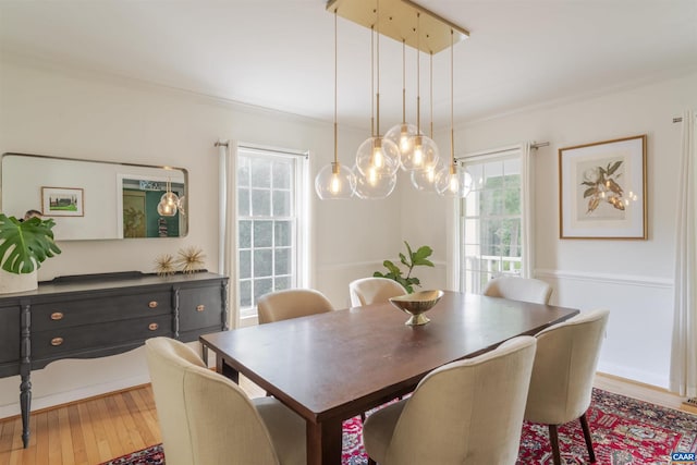 325 Heron Ln, Charlottesville, VA 22903 - dining area with wood finished floors and ornamental molding