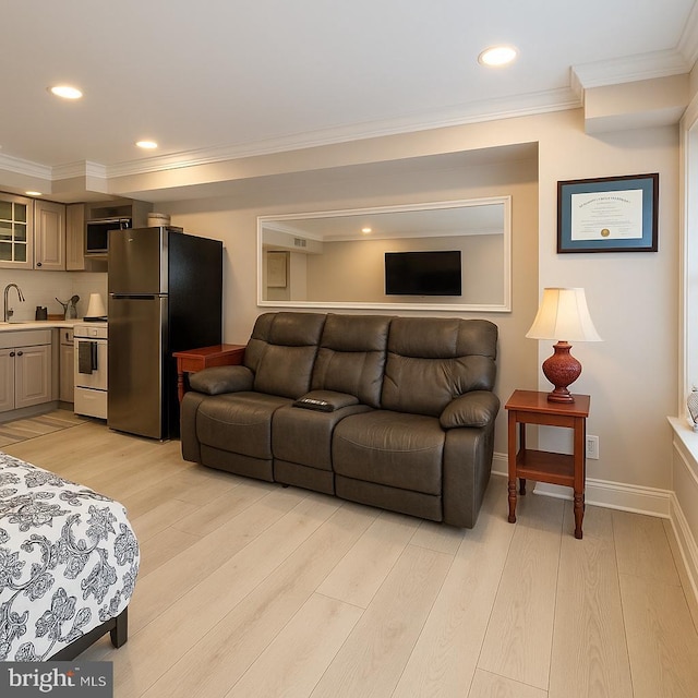 11 2nd St NE Unit 102, Washington, DC 20002 - living area with crown molding, light wood-style floors, and recessed lighting