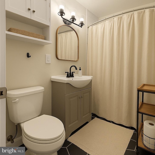 11 2nd St NE Unit 102, Washington, DC 20002 - bathroom with vanity, a shower with shower curtain, and tile patterned floors