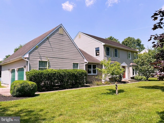 33 High Meadows Dr, Mullica Hill, NJ 08062 - view of front facade with a garage and a front yard