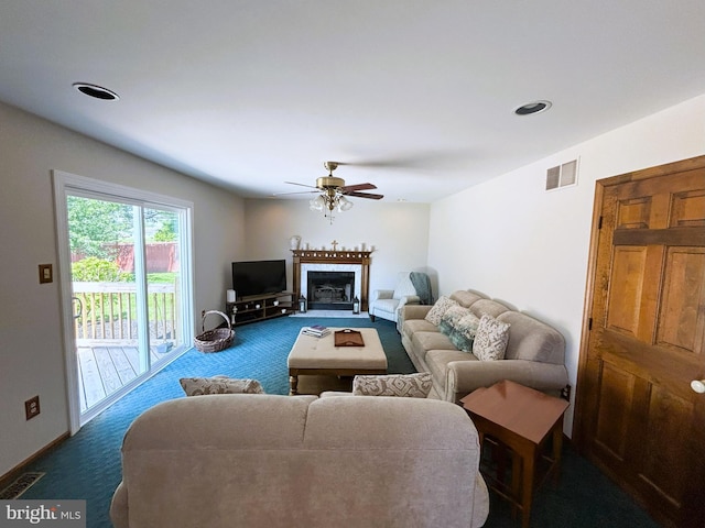 33 High Meadows Dr, Mullica Hill, NJ 08062 - living room with dark carpet, ceiling fan, a fireplace, and recessed lighting