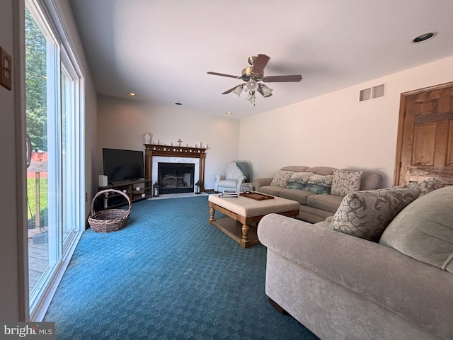 33 High Meadows Dr, Mullica Hill, NJ 08062 - carpeted living area with ceiling fan, a high end fireplace, and recessed lighting