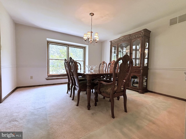 33 High Meadows Dr, Mullica Hill, NJ 08062 - dining space with a chandelier and light carpet
