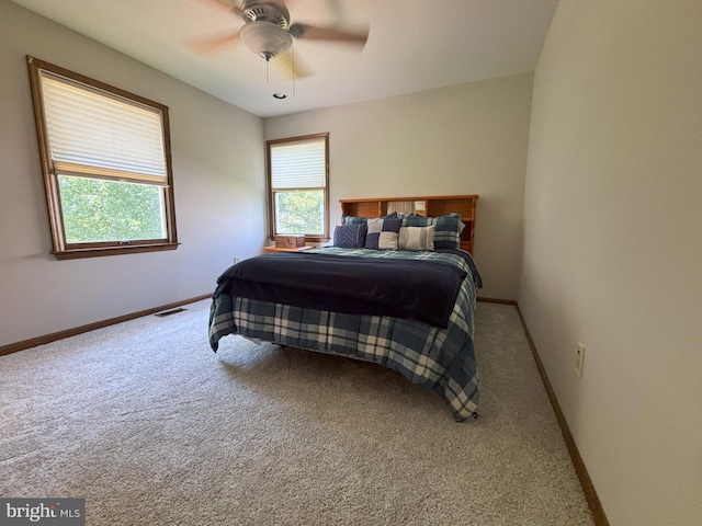 33 High Meadows Dr, Mullica Hill, NJ 08062 - carpeted bedroom featuring baseboards and a ceiling fan