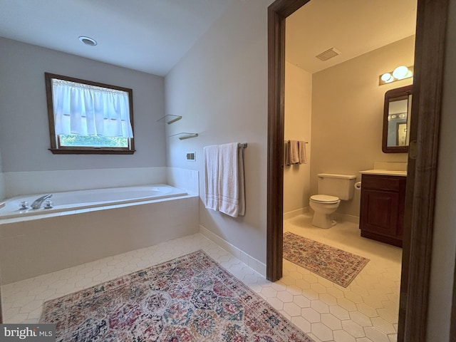 33 High Meadows Dr, Mullica Hill, NJ 08062 - bathroom featuring vanity, a garden tub, and tile patterned flooring