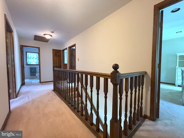 33 High Meadows Dr, Mullica Hill, NJ 08062 - hall with light colored carpet and an upstairs landing