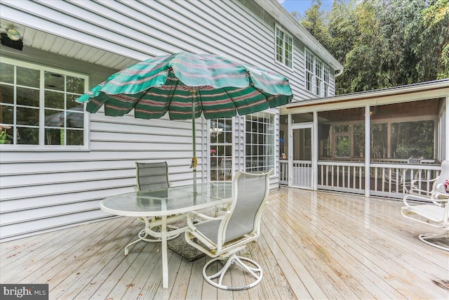 9409 Emory Grove Rd, Gaithersburg, MD 20877 - wooden deck with a sunroom and outdoor dining area