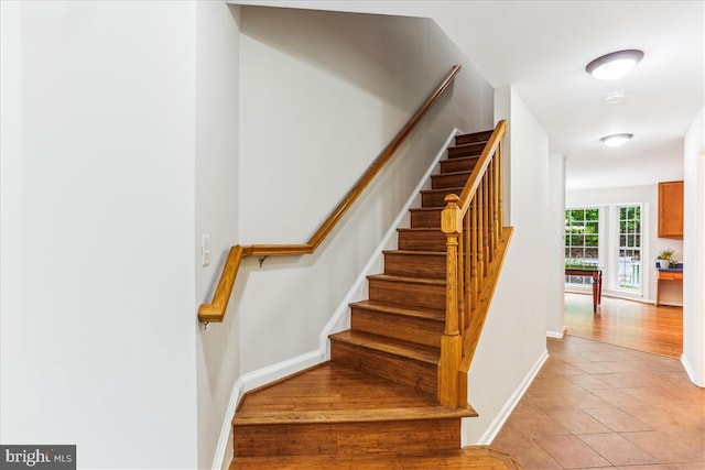 9409 Emory Grove Rd, Gaithersburg, MD 20877 - stairs with baseboards and tile patterned flooring