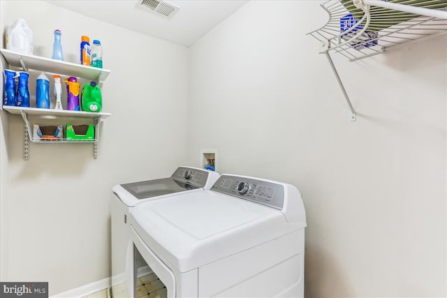 9409 Emory Grove Rd, Gaithersburg, MD 20877 - laundry room with washer and clothes dryer and baseboards