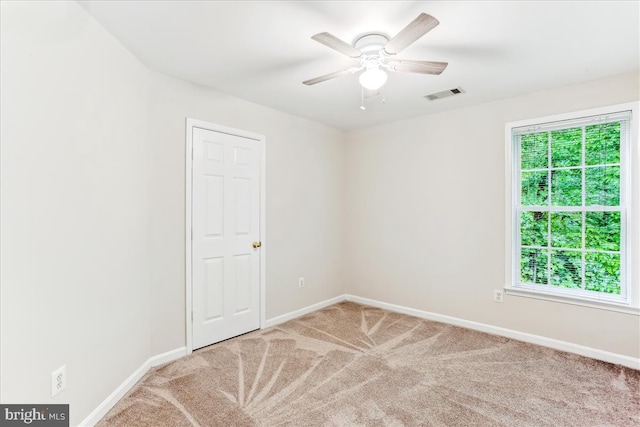 9409 Emory Grove Rd, Gaithersburg, MD 20877 - unfurnished room with carpet, plenty of natural light, and a ceiling fan
