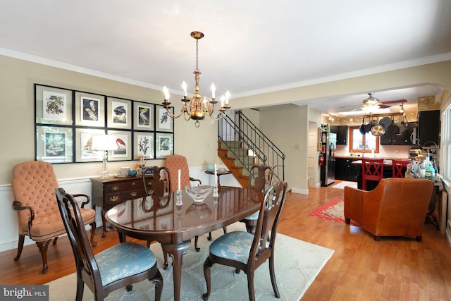 238 Winding Way Rd, Stratford, NJ 08084 - dining room with crown molding, a chandelier, stairs, light wood-type flooring, and a ceiling fan