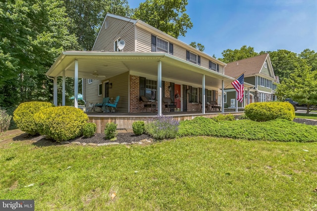 238 Winding Way Rd, Stratford, NJ 08084 - farmhouse inspired home featuring brick siding, a front lawn, and covered porch