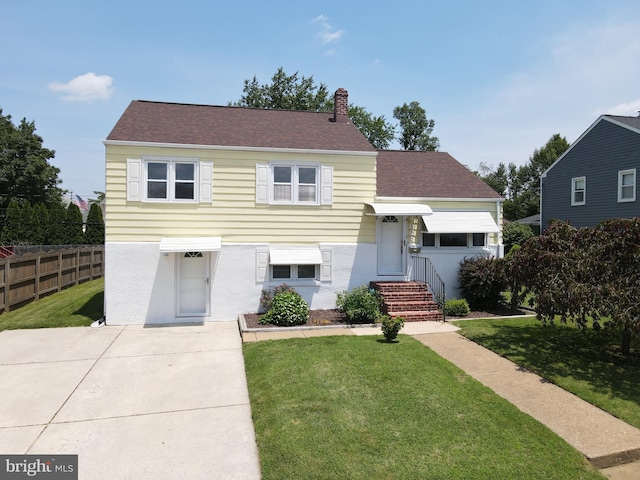 804 N Augustine St, Wilmington, DE 19804 - view of front of house with a chimney and roof with shingles