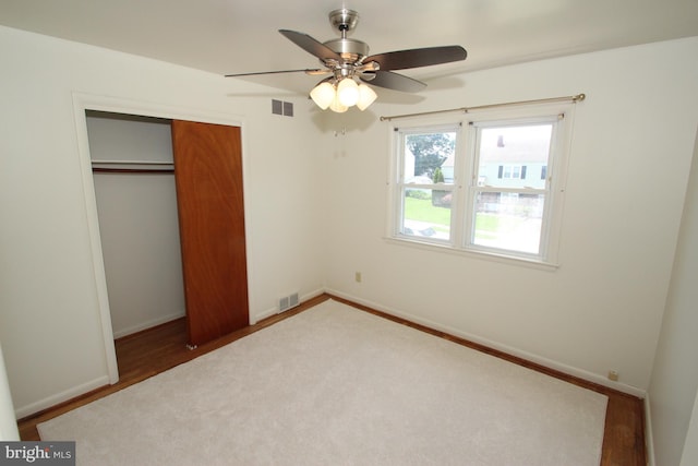 804 N Augustine St, Wilmington, DE 19804 - unfurnished bedroom featuring a closet, wood finished floors, and ceiling fan