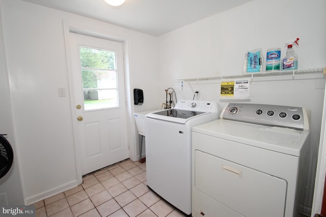804 N Augustine St, Wilmington, DE 19804 - laundry room featuring independent washer and dryer and light tile patterned floors