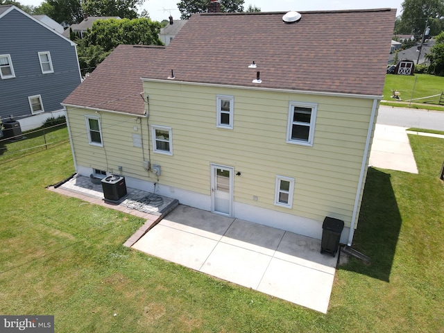 804 N Augustine St, Wilmington, DE 19804 - back of property with roof with shingles, a patio, and a chimney