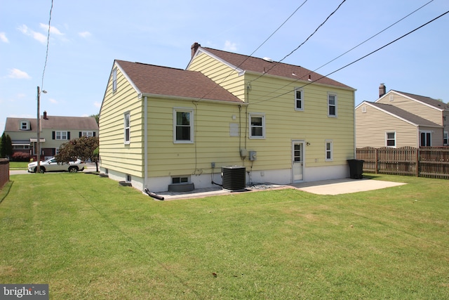 804 N Augustine St, Wilmington, DE 19804 - back of property with a patio and roof with shingles