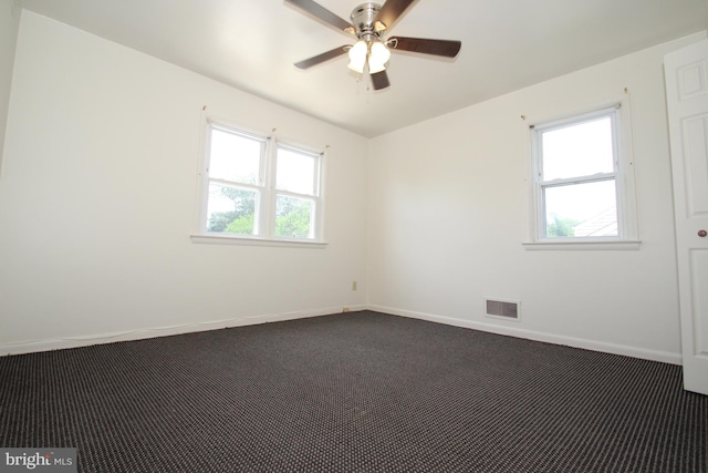 804 N Augustine St, Wilmington, DE 19804 - spare room with dark carpet and ceiling fan