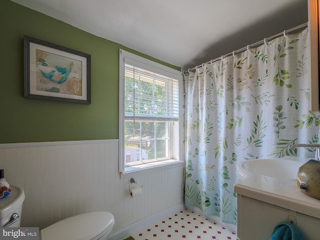 616 Glenfield Ave, Glenolden, PA 19036 - bathroom with a wainscoted wall, vanity, and a shower with shower curtain