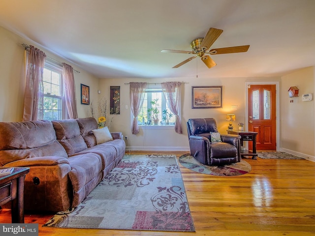 616 Glenfield Ave, Glenolden, PA 19036 - living area with plenty of natural light, wood finished floors, and a ceiling fan