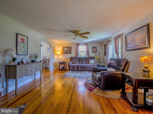 616 Glenfield Ave, Glenolden, PA 19036 - living room with ceiling fan, hardwood / wood-style floors, and arched walkways