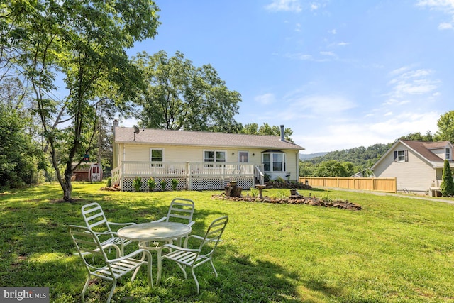 381 Youngs Dr, Front Royal, VA 22630 - rear view of house with a storage shed and a wooden deck