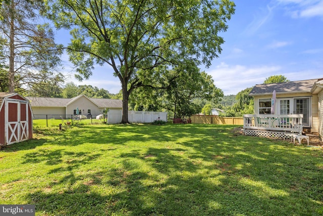 381 Youngs Dr, Front Royal, VA 22630 - fenced backyard featuring a storage shed and a wooden deck