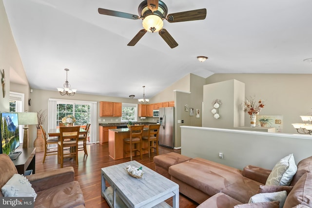 2 Evans Ln, Ruther Glen, VA 22546 - living room featuring a chandelier, vaulted ceiling, dark wood-style floors, and ceiling fan
