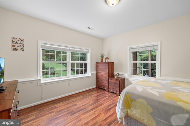 2 Evans Ln, Ruther Glen, VA 22546 - bedroom featuring wood finished floors and multiple windows