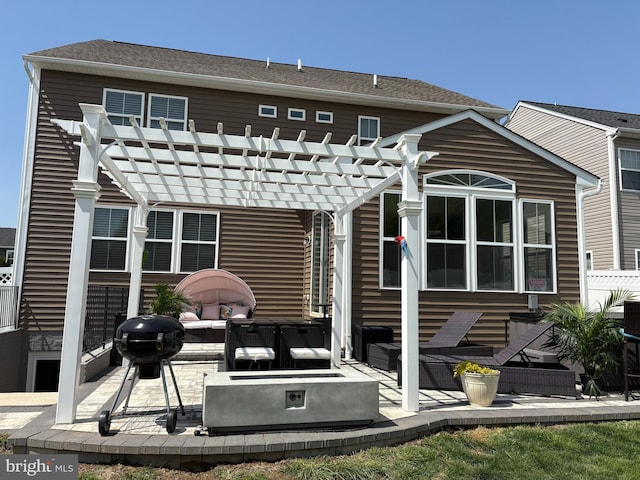 12507 Olivine Ct, Hagerstown, MD 21740 - back of property featuring a pergola, a patio area, and outdoor lounge area