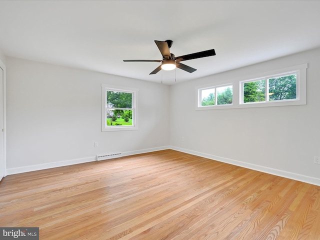 1020 Wyomissing Blvd, Wyomissing, PA 19610 - empty room with healthy amount of natural light, ceiling fan, and light wood finished floors