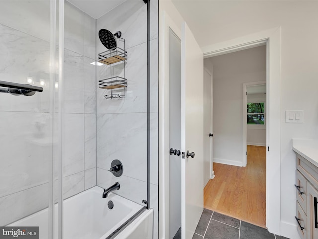 1020 Wyomissing Blvd, Wyomissing, PA 19610 - bathroom featuring  shower combination, vanity, and tile patterned flooring