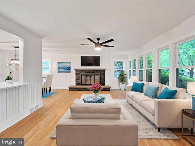 1020 Wyomissing Blvd, Wyomissing, PA 19610 - living area featuring ceiling fan, plenty of natural light, a chandelier, and wood finished floors