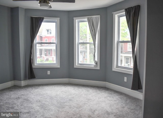 607 N Broom St, Wilmington, DE 19805 - spare room with a ceiling fan and carpet floors