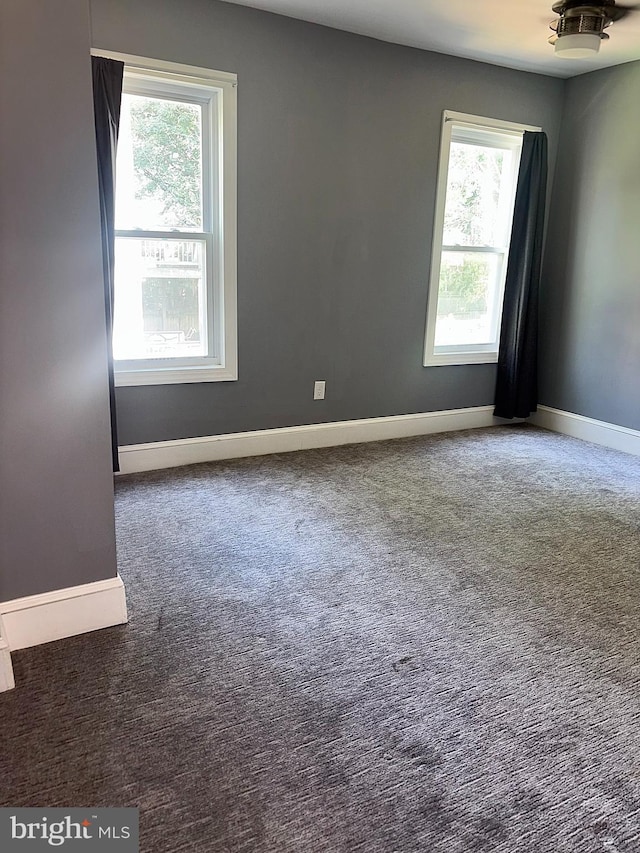 607 N Broom St, Wilmington, DE 19805 - unfurnished room featuring carpet and baseboards